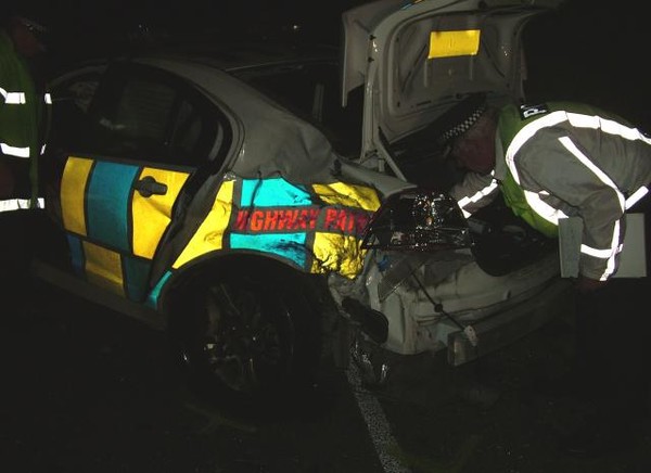 fatal collision between a Highway Patrol car and a motorcycle near Te Kauwhata yesterday